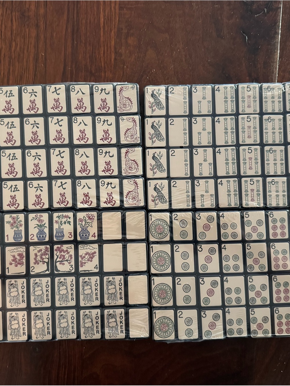 Black enrobed Mahjong Tiles